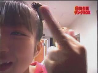 Tsuji shows her dirty finger